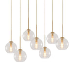 Seven-Globe Hanging Light with Adjustable Height Cords for Kitchen Island & Dining Table, Clear Glass Spheres, 35-Inch Canopy, E26 Base, Dim