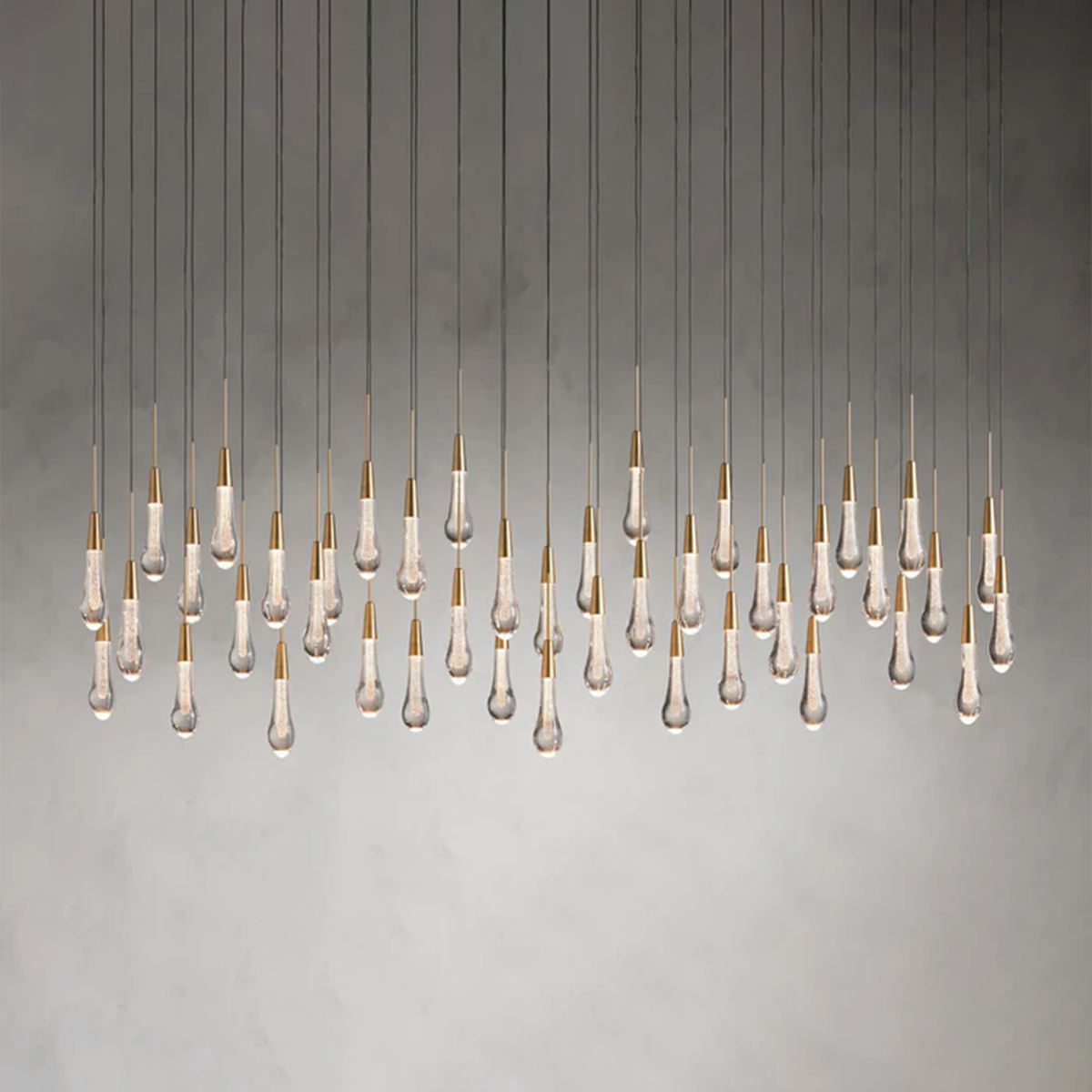 Cascading Raindrop Linear LED Chandelier – Textured Glass Orbs, Adjustable Height, Vaulted Ceiling Ready – 37 to 120 Inch Options